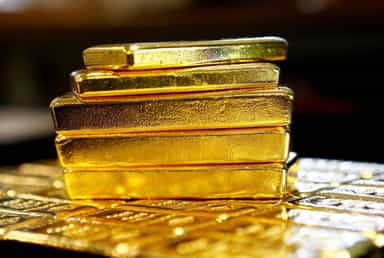 Gold set for biggest weekly fall in 10 on Fed's hawkish stance