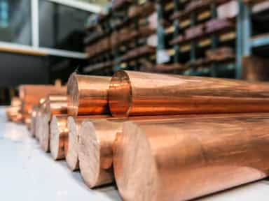 Copper pulls back from record on easing US tariff concerns, stronger dollar