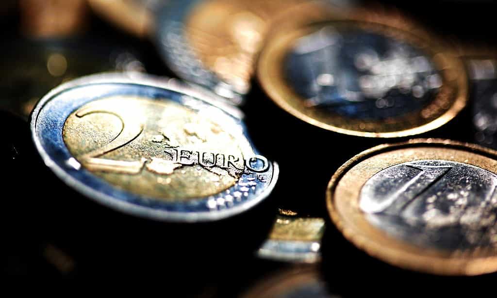 Euro leaps parity on ECB, U.S. stock futures eye higher open