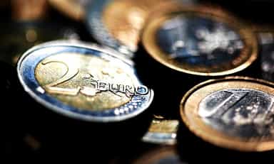 Euro leaps parity on ECB, U.S. stock futures eye higher open